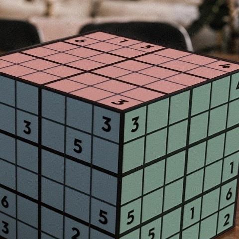Macro detail of the cube's corner showing three faces converging
